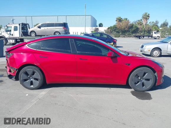 2023 Tesla Model 3 with VIN 5YJ3E1EA1PF385490, listed as a IAAI auction lot 42315884 with 17,590 mi miles and . Bid and sale history available at DreamBid. Image 14.