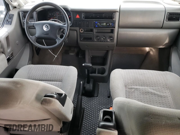 2002 Volkswagen EuroVan MV с VIN WV2NB47052H015757, выставлен на аукционе Copart как лот 81666434 с пробегом 191 543 миль миль и Чистый • Clean title. История ставок и продаж доступна на DreamBid. Изображение 8.