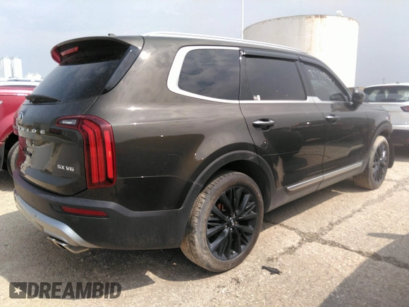 2020 Kia Telluride SX with VIN 5XYP5DHC7LG003935, listed as a IAAI auction lot 32399947 with 82,256 mi miles and . Bid and sale history available at DreamBid. Image 4.