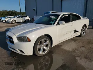 2013 Dodge Charger SXT with VIN 2C3CDXHG4DH709127, listed as a Copart auction lot 73497904 with 61,866 mi miles and Salvage Title. Bid and sale history available at carsss.com. Image 1.