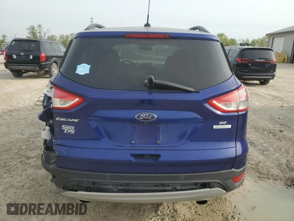 2015 Ford Escape SE with VIN 1FMCU0GX3FUB59712, listed as a Copart auction lot 53817045 with 100,580 mi miles and Salvage Title. Bid and sale history available at DreamBid. Image 6.