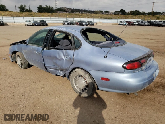 1998 Ford Taurus SE Comfort with VIN 1FAFP53S7WG223397, listed as a Copart auction lot 74794624 with 76,614 mi miles and Salvage title. Bid and sale history available at DreamBid. Image 2.