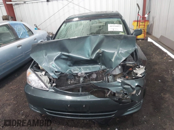 2004 Toyota Camry LE with VIN 4T1BE30K54U377818, listed as a IAAI auction lot 41931027 with 212,690 mi miles. Bid and sale history available at carsss.com. Image 12.