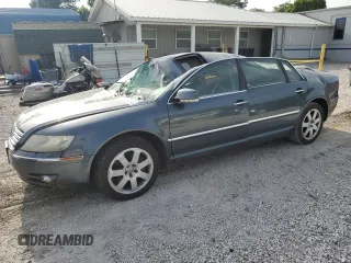 2004 Volkswagen Phaeton V8 z VIN WVWAF63D848010657, wystawiony jako Copart lot #56595145 z przebiegiem 192 013 mil mil oraz Szkoda całkowita • Salvage title. Historia ofert i sprzedaży dostępna na DreamBid. Obrazek 1.