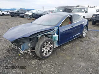 2017 Tesla Model S 100D with VIN 5YJSA1E25HF184502, listed as a IAAI auction lot 41834310 with 92,887 mi miles and . Bid and sale history available at DreamBid. Image 2.