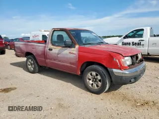 1998 Nissan Frontier XE with VIN 1N6DD21S4WC328785, listed as a Copart auction lot 62424085 with Not provided miles and Salvage title. Bid and sale history available at DreamBid. Image 4.