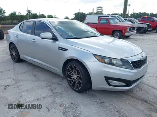 2013 Kia Optima LX with VIN KNAGM4A75D5380478, listed as a IAAI auction lot 42153829 with 82,845 mi miles. Bid and sale history available at carsss.com. Image 1.