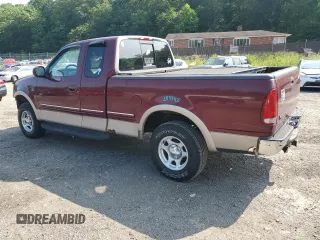 1998 Ford F-150 with VIN 1FTZX18W8WNB76999, listed as a Copart auction lot 59845595 with 135,063 mi miles and Salvage title. Bid and sale history available at DreamBid. Image 2.