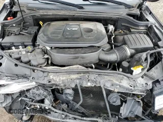 2017 Jeep Grand Cherokee Overland with VIN 1C4RJFCG8HC607872, listed as a Copart auction lot 57493195 with 164,478 mi miles and Salvage title. Bid and sale history available at DreamBid. Image 12.