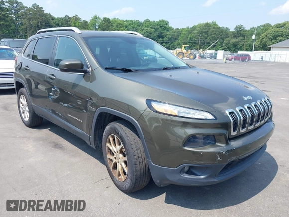 2015 Jeep Cherokee Latitude z VIN 1C4PJMCS9FW551694, wystawiony jako IAAI lot #42424992 z przebiegiem 125 852 mil mil oraz . Historia ofert i sprzedaży dostępna na DreamBid. Obrazek 1.