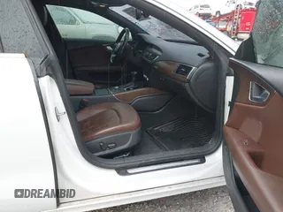 2014 Audi A7 Premium Plus z VIN WAUWGAFC0EN083417, wystawiony jako IAAI lot #41350273 z przebiegiem 163 402 mil mil oraz . Historia ofert i sprzedaży dostępna na DreamBid. Obrazek 5.