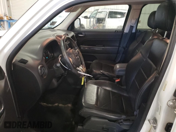 2011 Jeep Patriot Latitude X with VIN 1J4NF4GB2BD263910, listed as a Copart auction lot 84872014 with 162,067 mi miles and Salvage Title. Bid and sale history available at DreamBid. Image 7.