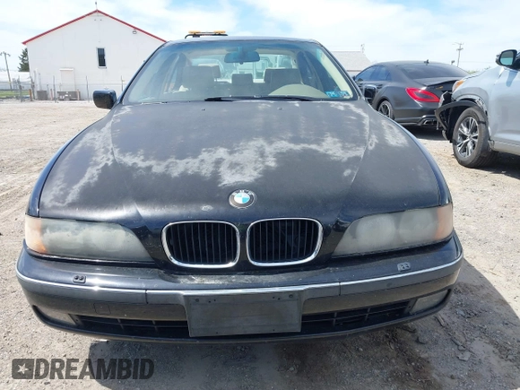 1999 BMW 5 Series 528iA with VIN WBADM6331XBY29010, listed as a IAAI auction lot 42103420 with 196,575 mi miles. Bid and sale history available at carsss.com. Image 6.