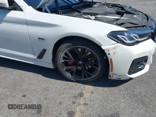 2023 BMW 5 Series 530e with VIN WBA13AG09PCM41820, listed as a IAAI auction lot 42409541 with 17,715 mi miles and . Bid and sale history available at DreamBid. Image 6.