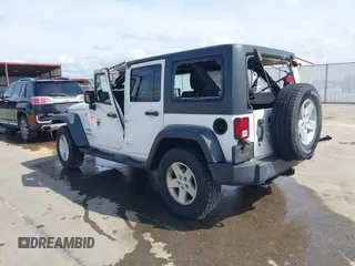 2018 Jeep Wrangler Unlimited Sport S with VIN 1C4BJWDG3JL810853, listed as a IAAI auction lot 42074032 with 141,942 mi miles and . Bid and sale history available at DreamBid. Image 3.