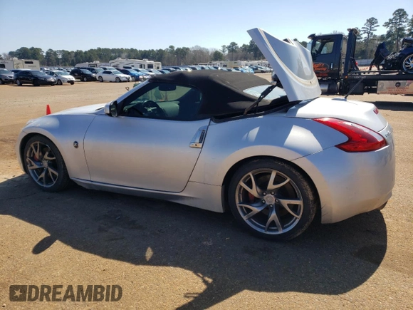 2014 Nissan 370Z Touring with VIN JN1AZ4FH4EM620612, listed as a Copart auction lot 47163375 with 148,458 mi miles and Clean Title. Bid and sale history available at DreamBid. Image 2.