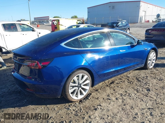 2019 Tesla Model 3 Long Range with VIN 5YJ3E1EB7KF454636, listed as a IAAI auction lot 41853972 with 56,916 mi miles. Bid and sale history available at carsss.com. Image 4.