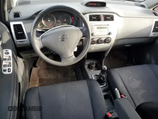 2005 Suzuki Aerio S z VIN JS2RA61S955250683, wystawiony jako Copart lot #69746534 z przebiegiem 251 452 mil mil oraz Szkoda całkowita • Salvage title. Historia ofert i sprzedaży dostępna na DreamBid. Obrazek 8.
