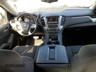 2016 GMC Yukon XL SLE with VIN 1GKS2FKC4GR285826, listed as a Copart auction lot 69486214 with 58,879 mi miles and Clean Title. Bid and sale history available at DreamBid. Image 8.