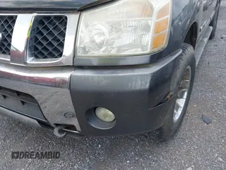 2005 Nissan Titan LE z VIN 1N6AA07B05N557667, wystawiony jako IAAI lot #42292562 z przebiegiem 197 874 mil mil oraz . Historia ofert i sprzedaży dostępna na DreamBid. Obrazek 14.