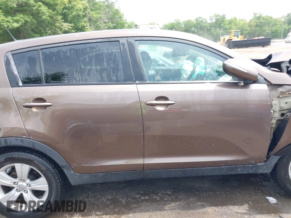 2012 Kia Sportage LX with VIN KNDPB3A20C7290990, listed as a IAAI auction lot 42264420 with 87,994 mi miles and . Bid and sale history available at DreamBid. Image 13.