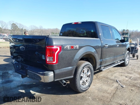 2015 Ford F-150 XLT with VIN 1FTEW1EG6FKF22211, listed as a IAAI auction lot 41753438 with 130,019 mi miles. Bid and sale history available at carsss.com. Image 4.