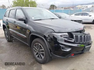 2021 Jeep Grand Cherokee Trailhawk with VIN 1C4RJFLT4MC771773, listed as a IAAI auction lot 42063954 with 17,920 mi miles and . Bid and sale history available at DreamBid. Image 1.