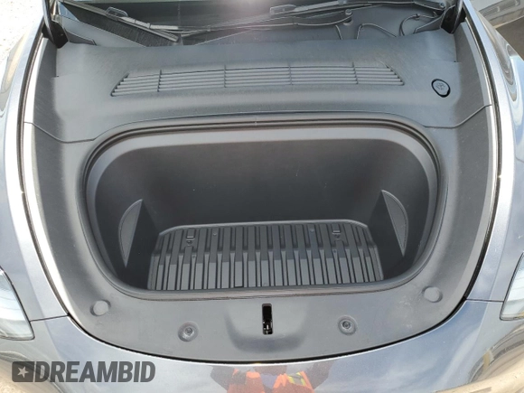 2024 Tesla Model Y Long Range with VIN 7SAYGAEE5RF088151, listed as a Copart auction lot 52651015 with 6,185 mi miles and Clean title. Bid and sale history available at DreamBid. Image 11.