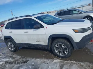 2019 Jeep Cherokee Trailhawk Elite with VIN 1C4PJMBX0KD315275, listed as a IAAI auction lot 41630464 with 94,558 mi miles. Bid and sale history available at carsss.com. Image 13.