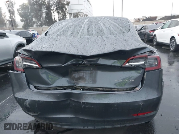2018 Tesla Model 3 Long Range Battery with VIN 5YJ3E1EB1JF149423, listed as a IAAI auction lot 41896090 with 158,787 mi miles and . Bid and sale history available at DreamBid. Image 17.