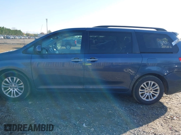 2014 Toyota Sienna XLE with VIN 5TDYK3DC2ES431320, listed as a IAAI auction lot 41977059 with 158,711 mi miles and . Bid and sale history available at DreamBid. Image 14.