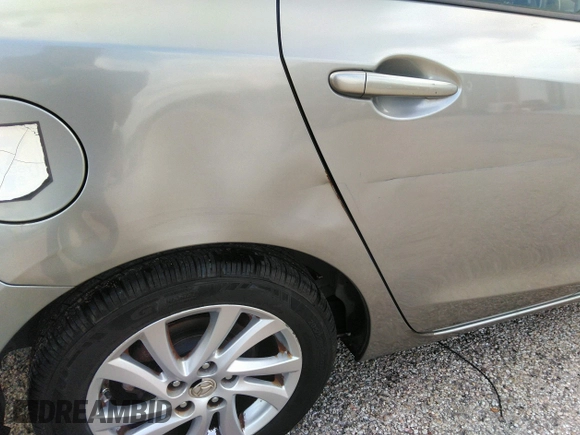 2012 Mazda 3 i Touring z VIN JM1BL1V83C1622692, wystawiony jako IAAI lot #42447571 z przebiegiem 136 065 mil mil oraz . Historia ofert i sprzedaży dostępna na DreamBid. Obrazek 6.