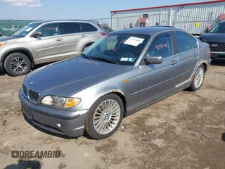 2003 BMW 3 Series 330xi with VIN WBAEW534X3PN31070, listed as a IAAI auction lot 41776406 with 176,383 mi miles. Bid and sale history available at carsss.com. Image 2.
