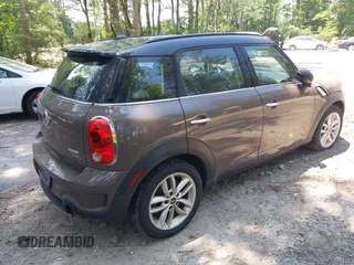 2012 MINI Countryman S with VIN WMWZC5C57CWL62344, listed as a IAAI auction lot 42576587 with 191,597 mi miles and . Bid and sale history available at DreamBid. Image 4.