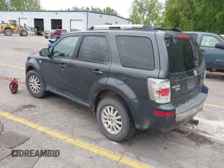 2009 Mercury Mariner Premier z VIN 4M2CU87759KJ17765, wystawiony jako IAAI lot #42354423 z przebiegiem 163 907 mil mil oraz . Historia ofert i sprzedaży dostępna na DreamBid. Obrazek 3.