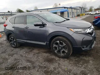 2017 Honda CR-V Touring with VIN 2HKRW2H90HH657450, listed as a Copart auction lot 52821895 with 154,801 mi miles and Salvage Title. Bid and sale history available at carsss.com. Image 4.