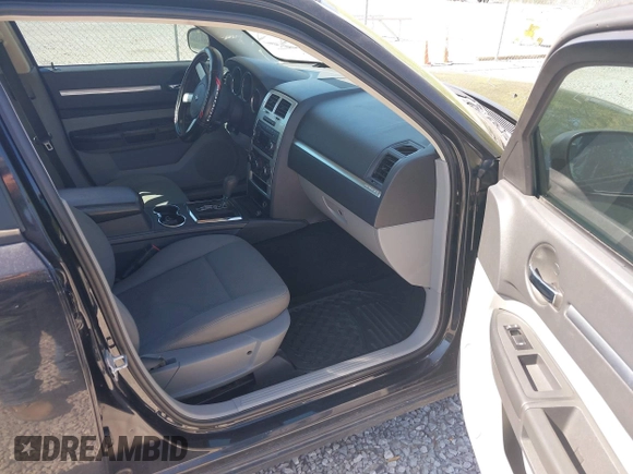 2008 Dodge Charger with VIN 2B3KA43G38H333646, listed as a IAAI auction lot 42037075 with 187,873 mi miles and . Bid and sale history available at carsss.com. Image 5.