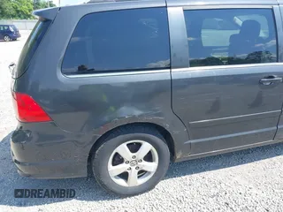 2011 Volkswagen Routan SE with VIN 2V4RW3DGXBR669762, listed as a IAAI auction lot 42693493 with 105,415 mi miles and . Bid and sale history available at DreamBid. Image 6.