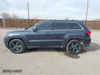 2015 Jeep Grand Cherokee Altitude with VIN 1C4RJFAG3FC608198, listed as a IAAI auction lot 41512629 with 154,647 mi miles. Bid and sale history available at carsss.com. Image 14.