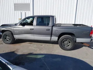 2001 Dodge Dakota Sport with VIN 1B7HL2AN21S319390, listed as a IAAI auction lot 40836729 with 118,823 mi miles. Bid and sale history available at carsss.com. Image 14.