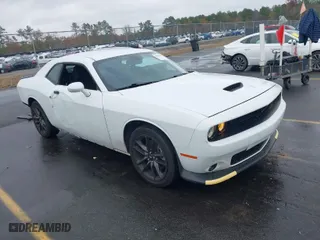 2022 Dodge Challenger GT with VIN 2C3CDZKG2NH156712, listed as a IAAI auction lot 41052967 with 48,686 mi miles. Bid and sale history available at carsss.com. Image 1.