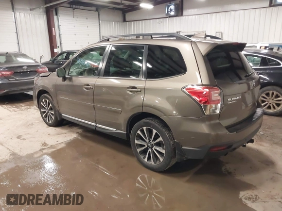 2017 Subaru Forester Touring with VIN JF2SJGWC0HH810100, listed as a IAAI auction lot 41646141 with 69,556 mi miles. Bid and sale history available at carsss.com. Image 3.