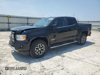 2016 GMC Canyon 4WD SLE with VIN 1GTG6CE33G1108988, listed as a Copart auction lot 60056215 with 119,735 mi miles and Salvage title. Bid and sale history available at DreamBid. Image 1.