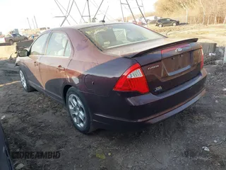 2011 Ford Fusion SE with VIN 3FAHP0HA2BR165178, listed as a IAAI auction lot 41774046 with 130,000 mi miles. Bid and sale history available at carsss.com. Image 3.