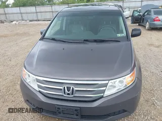 2012 Honda Odyssey EX-L with VIN 5FNRL5H60CB054277, listed as a IAAI auction lot 42459861 with 205,722 mi miles and . Bid and sale history available at DreamBid. Image 12.
