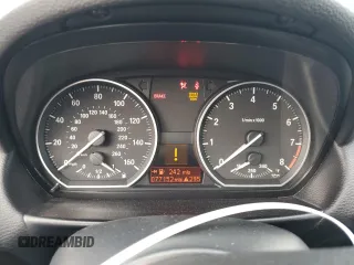 2012 BMW 1 Series 135i with VIN WBAUN7C59CVM26082, listed as a Copart auction lot 74711754 with 77,152 mi miles and Salvage title. Bid and sale history available at DreamBid. Image 9.
