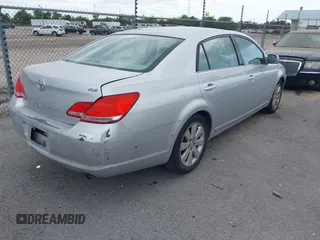 2007 Toyota Avalon XL with VIN 4T1BK36B47U191188, listed as a IAAI auction lot 42127335 with 213,701 mi miles. Bid and sale history available at carsss.com. Image 4.