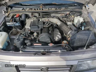 1995 Suzuki Sidekick JX z VIN 2S3TD03V2S6408939, wystawiony jako Copart lot #78862794 z przebiegiem 88 216 mil mil oraz Tytuł czysty. Historia ofert i sprzedaży dostępna na DreamBid. Obrazek 12.