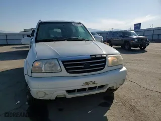 2002 Suzuki XL-7 Standard with VIN JS3TX92VX24118298, listed as a Copart auction lot 42781415 with 312,010 mi miles and Salvage Title. Bid and sale history available at carsss.com. Image 12.