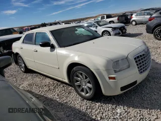 2005 Chrysler 300 with VIN 2C3JA43R25H616700, listed as a Copart auction lot 72081044 with 143,129 mi miles and Salvage Title. Bid and sale history available at carsss.com. Image 4.